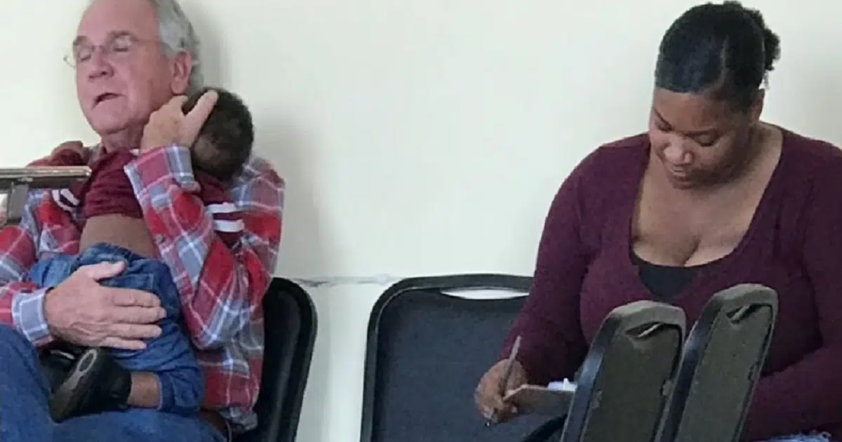 Man Holds Stranger’s Baby in Waiting Room Unaware His Every Move is Being Watched