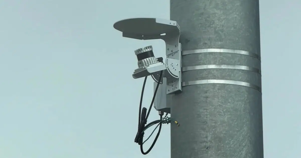 What’s the Purpose of That Little White Device on the Traffic Light Pole?